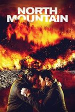 Official poster for North Mountain (2015). Two Indigenous men are in a conflicting embrace with a background of rubble and flames.